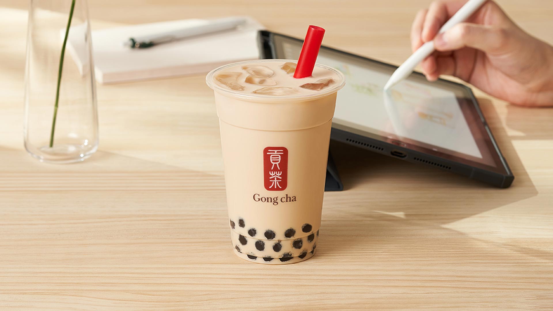 Gong cha drink on table while working